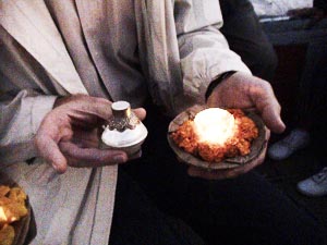 ashes in perfume bottle